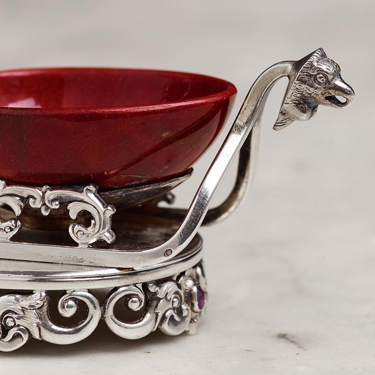 A Fabergé purpurin and silver salt-cellar, workmaster Erik Kollin, St. Petersburg before 1896. Scratched inventory no.