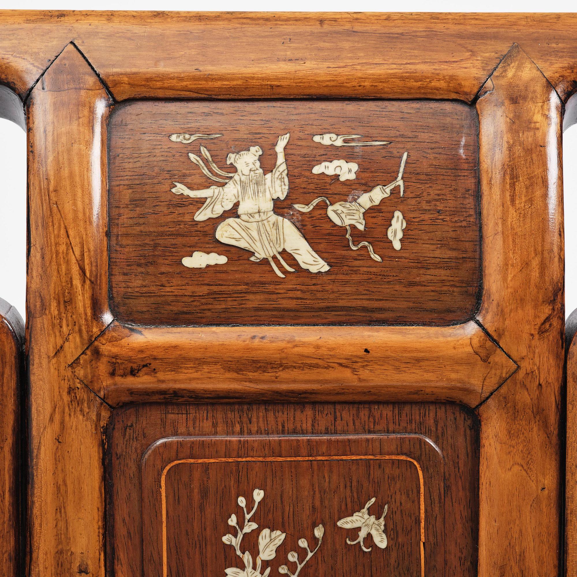 A pair of hardwood armchairs, late Qing dynasty.