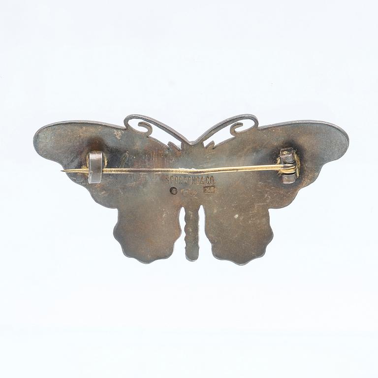 Sporrong, brosch silver och emalj, Stockholm 1948.