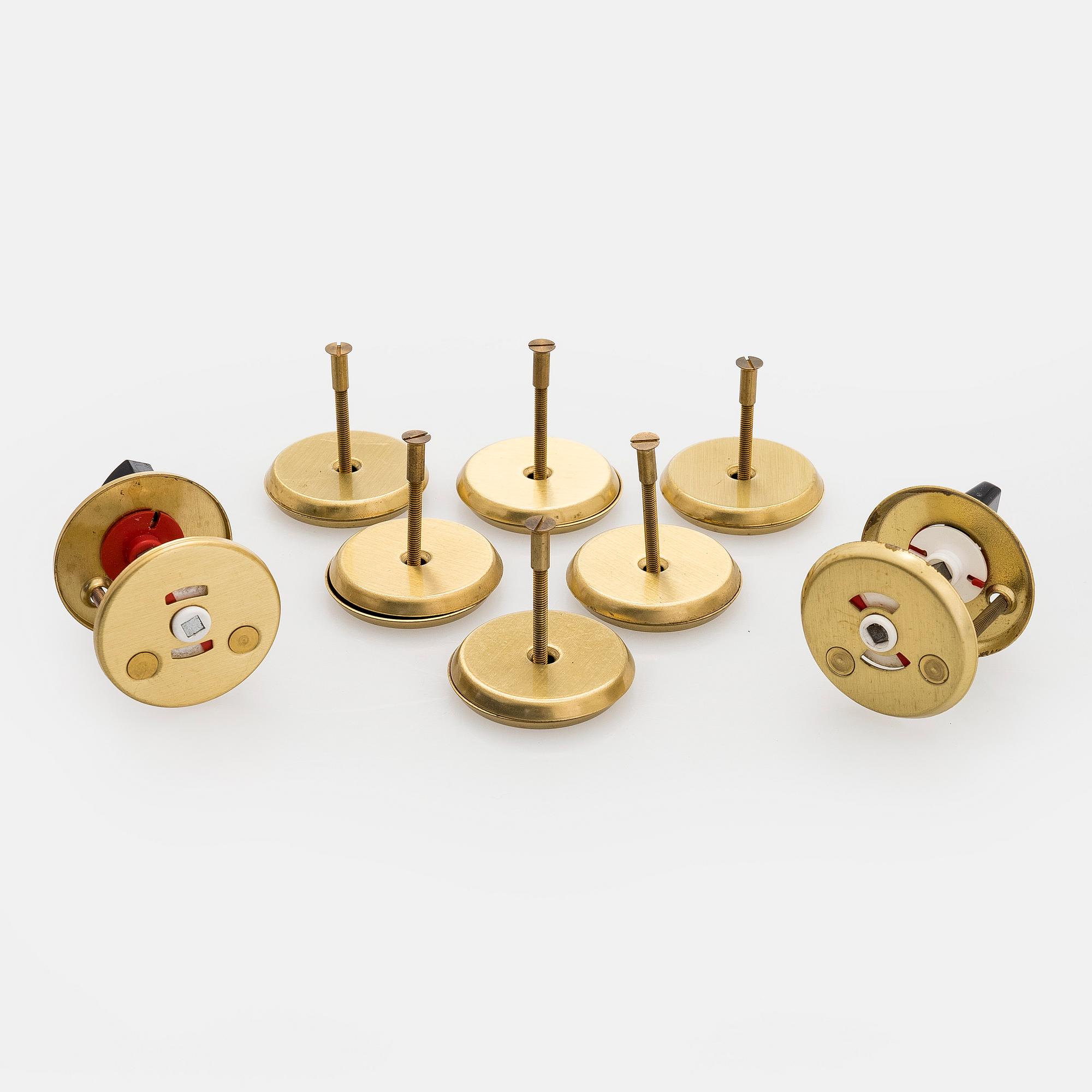 A set of eight 1960s-70s door handles.