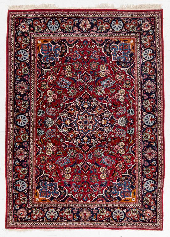 An oriental carpet, approx. 170 x 100 cm.