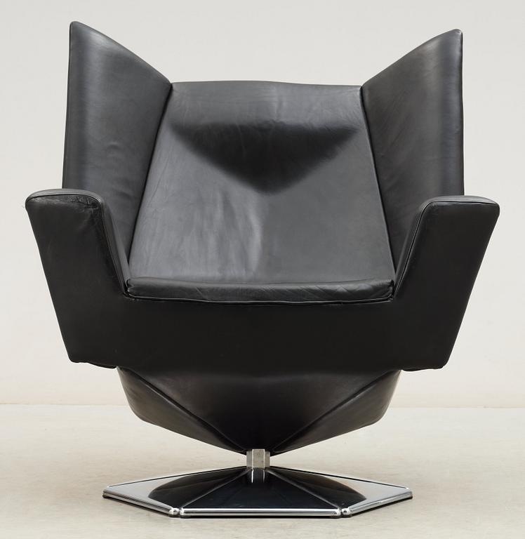 A Voitto Haapalainen black artificial leather and steel 'Prisma' easy chair, Tehokaluste Oy.