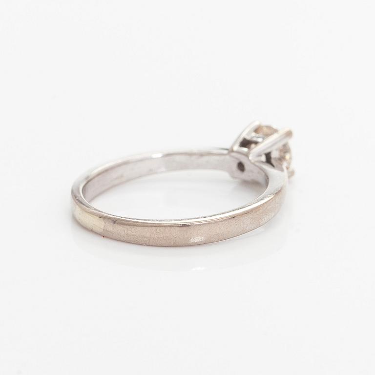 Ring, brilliant cut diamond, 14K white gold.
