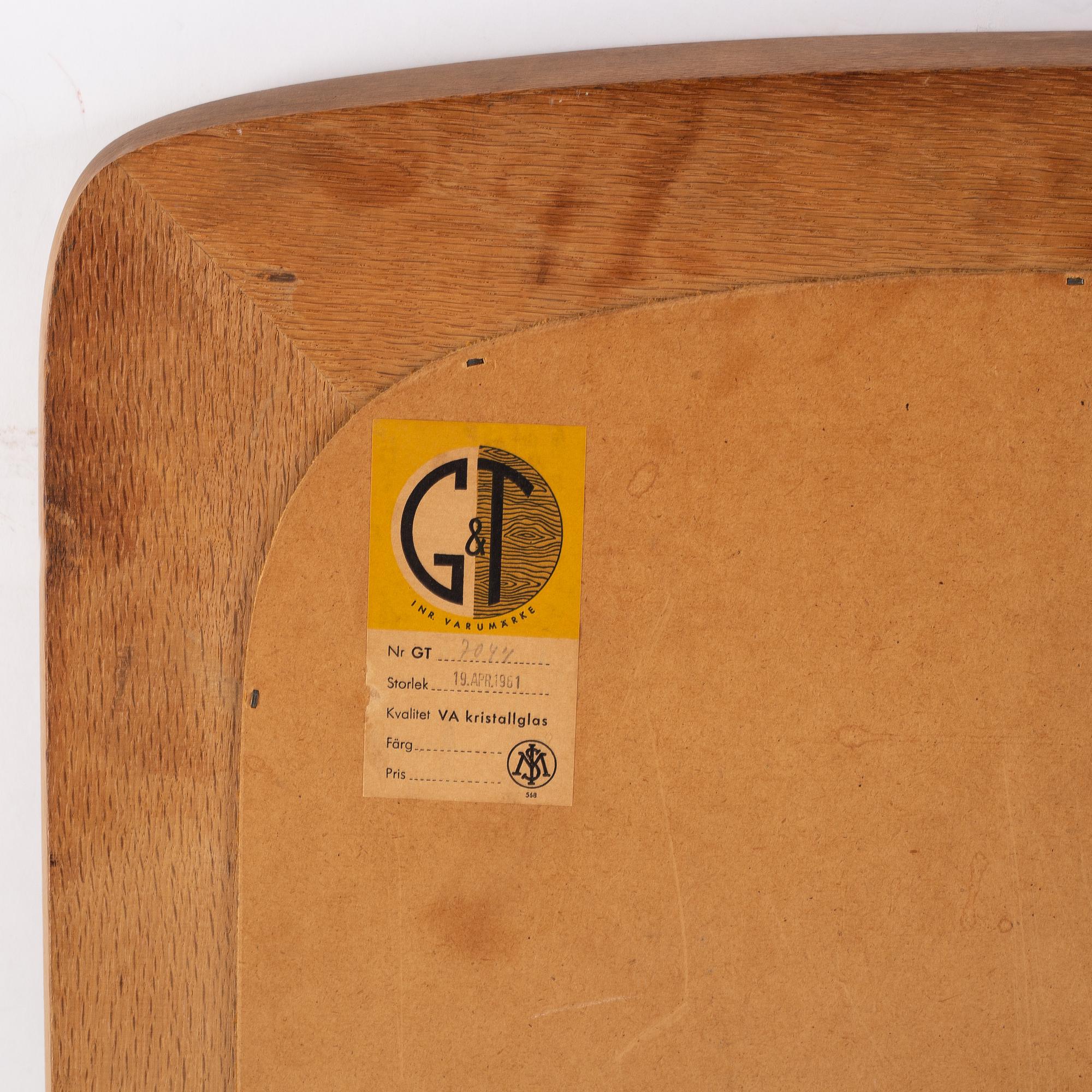 A pair of oak mirrors from Glas & Trä, dated 1961.