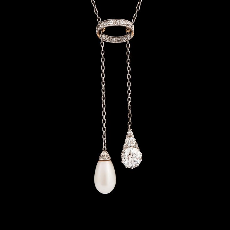 An old cut diamond and natural pearl pendant/necklace, c. 1905.