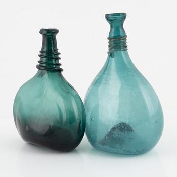 A set of two glass bottles, 19th century.