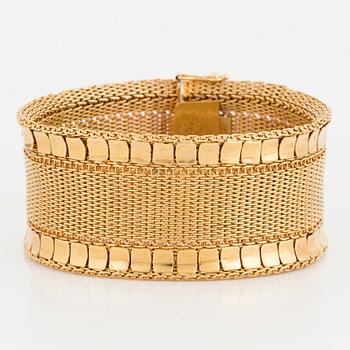 BRACELET, 18K gold, woven pattern with polished rectangular discs along the edges.