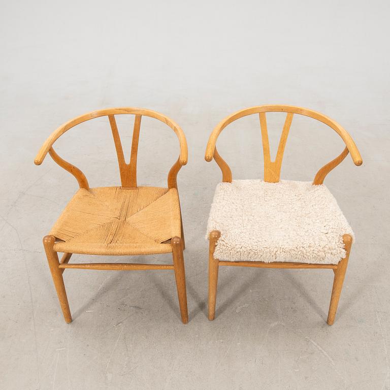 Hans J. Wegner, chairs, a pair of "The Wishbone Chair", model CH-24, Carl Hansen & Søn, Denmark.