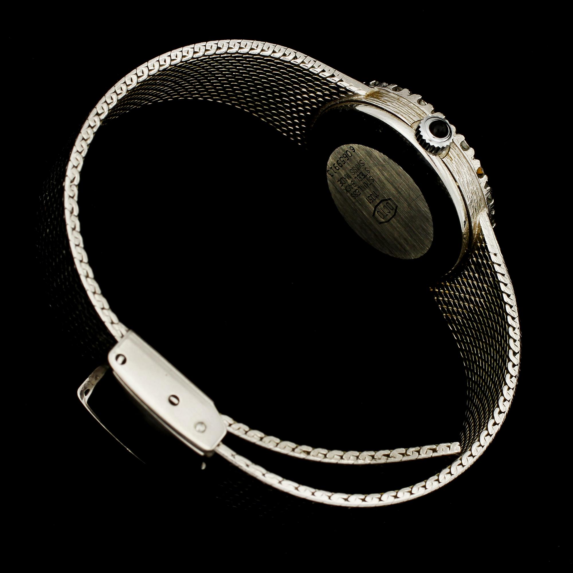 DAMARMBANDSUR, Octo, Schweiz, rostfritt stål, 1900-tal. Vikt 35 g.