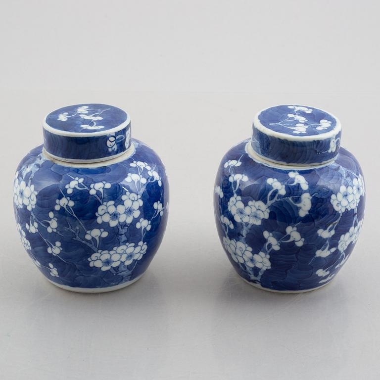 A pair of blue and white pots with covers, China, late Qing dynasty.