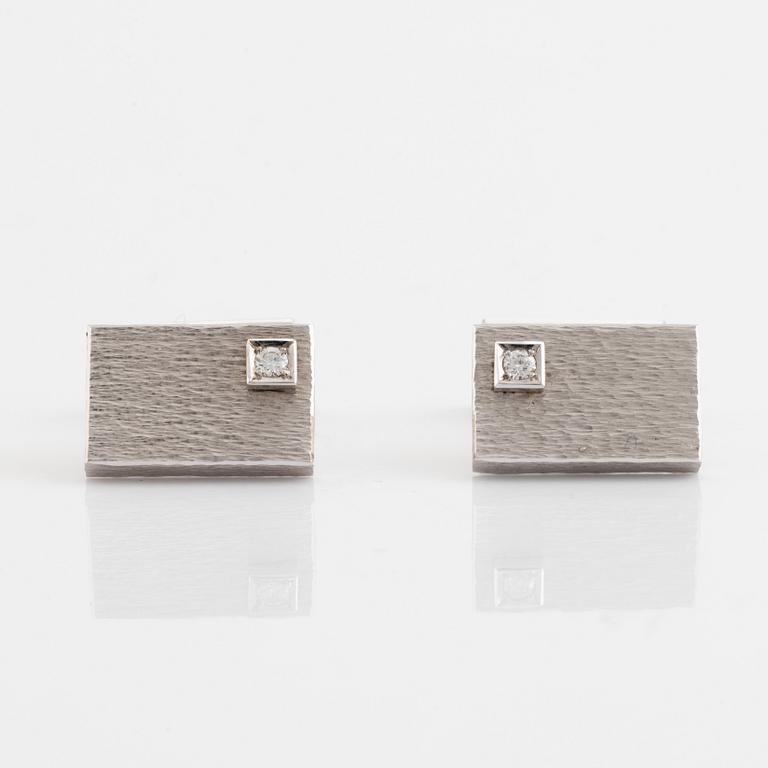 Bucherer 18K white gold and brilliant cut diamond cufflinks.