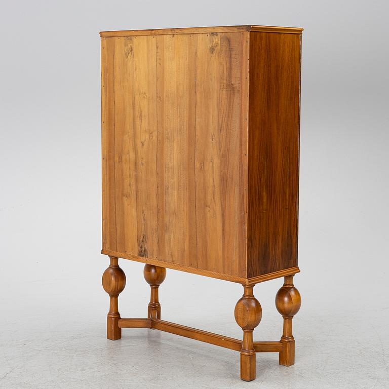 Eugen Höglund, a walnut cabinet, executed in his workshop in Vetlanda, Sweden 1950s.