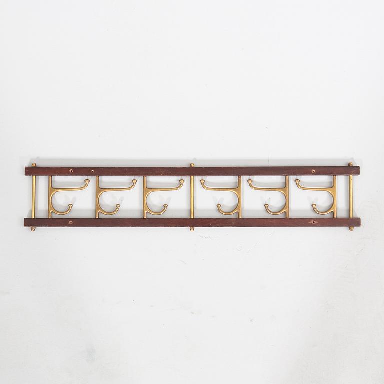 Clothes hanger, "Decorative", Skoglund metal foundry, Anderstorp, mid-20th century.