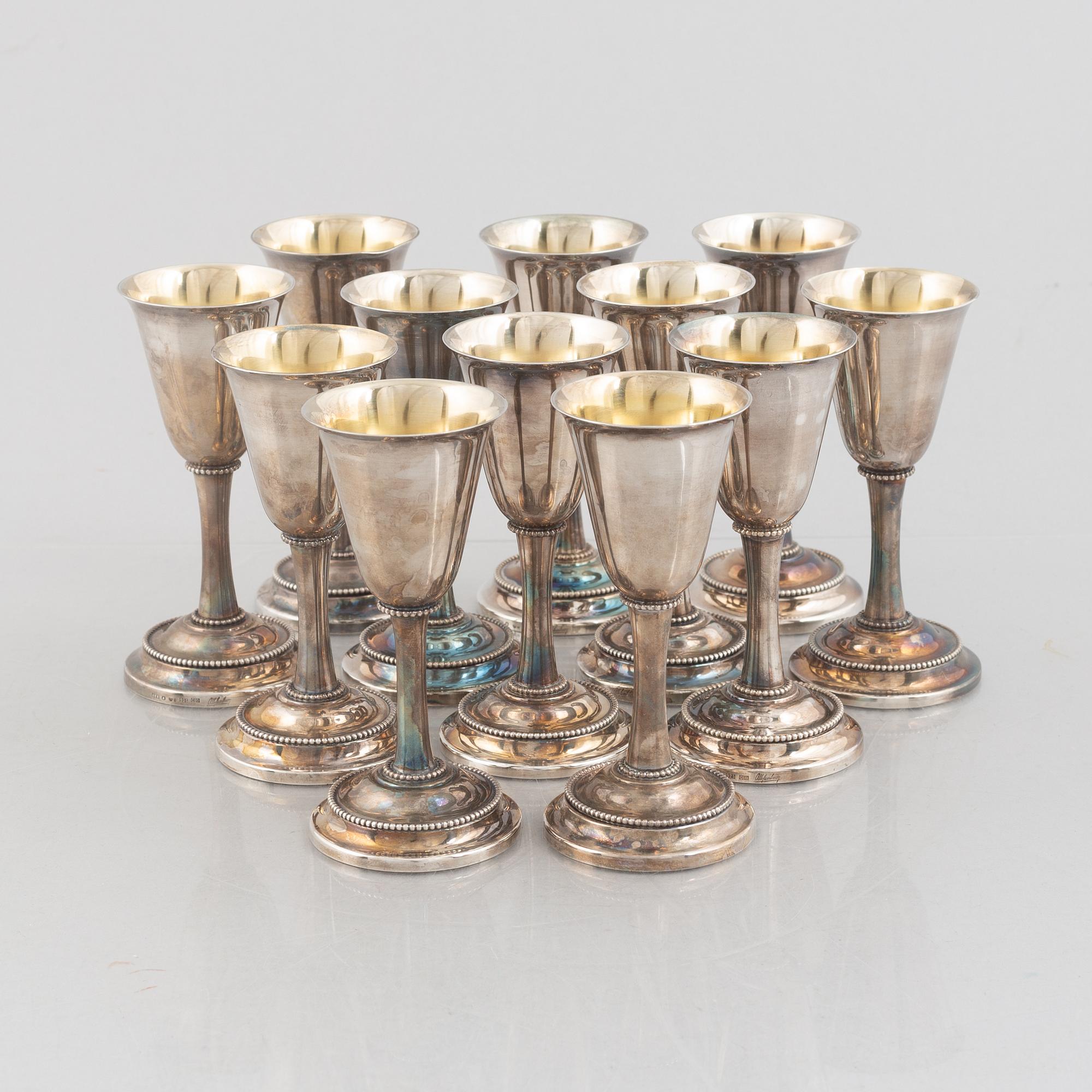 Karl-Axel Karlsson Silversmed, twelve sterling silver cups, Stockholm 1975-85.