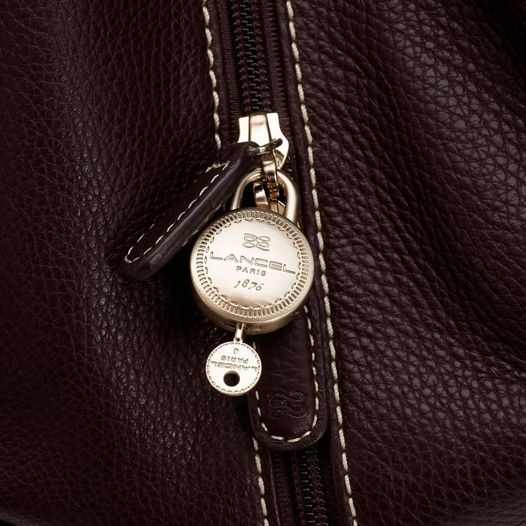 LANCEL, a brown leather bag.