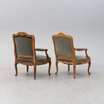 Two armchairs, Louix XV, second half of the 18th century and Louis XV-style, early 20th century.