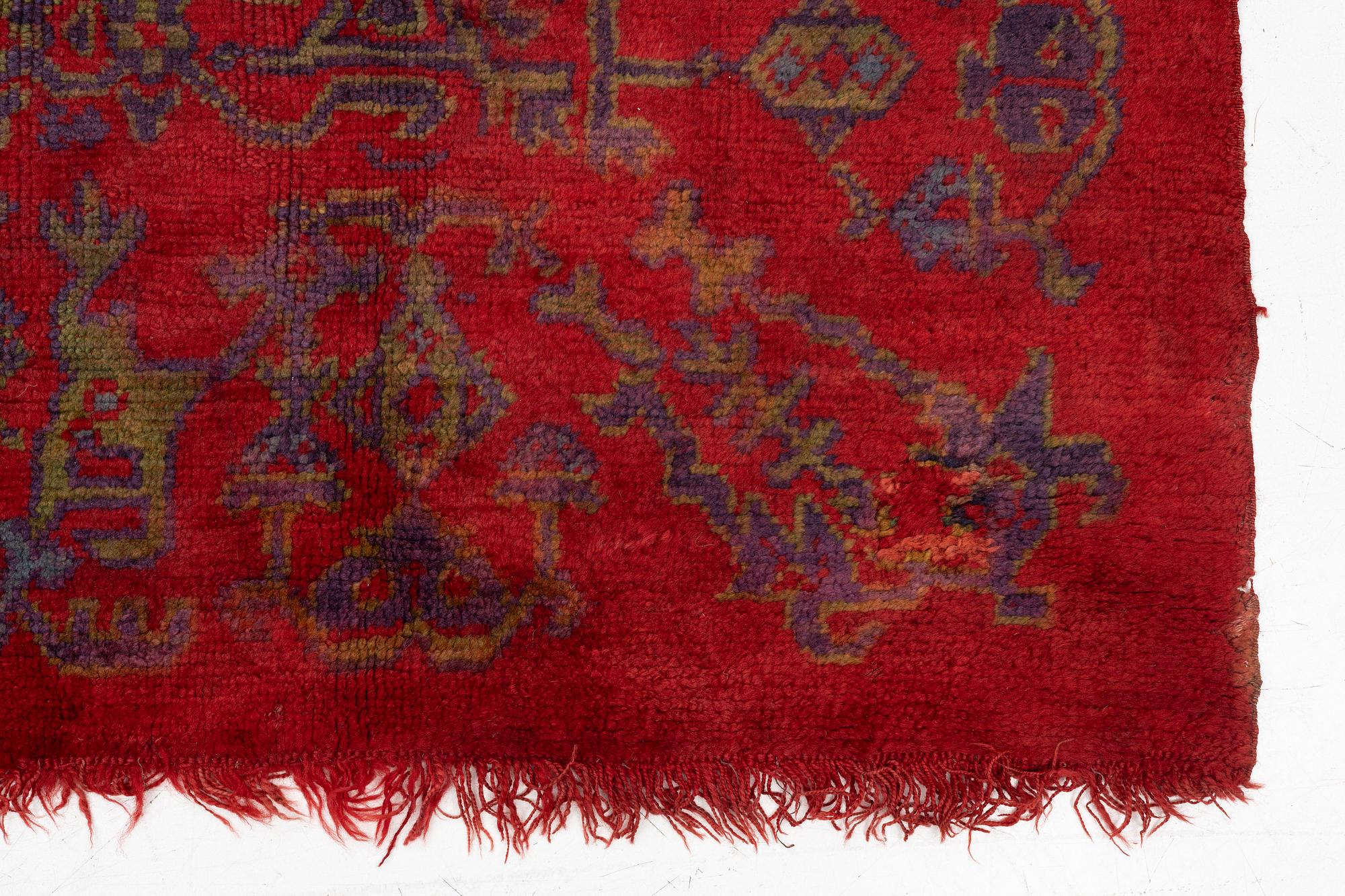 An antique Ushak carpet, West Anatolia, approx. 327 x 250.