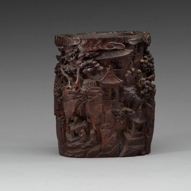 A wooden brush pot, late Qing dynasty (1644-1912).