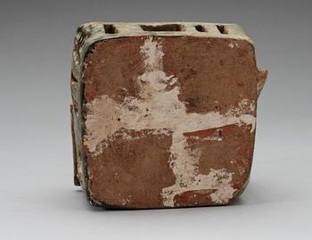 A green glazed pottery model of a house, Han dynasty (206 BC-220 AD).