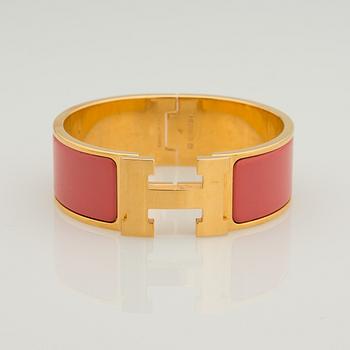 ARMBAND, bijouteri, Hermès "clic H", guldfärgad metall.