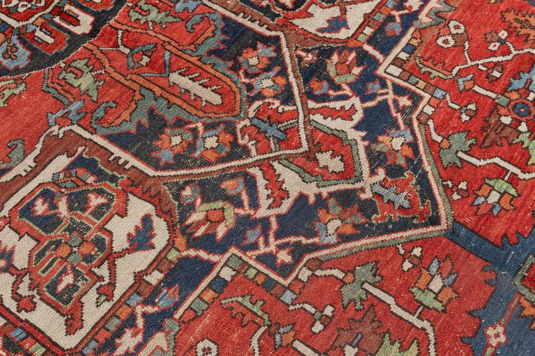 An antique Heris/Karadja carpet, approximately 501 x 339-353 cm.