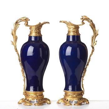 A pair of gilt bronze mounted vases, Qing dynasty, Qianlong (1736-95). French bronze mounts.