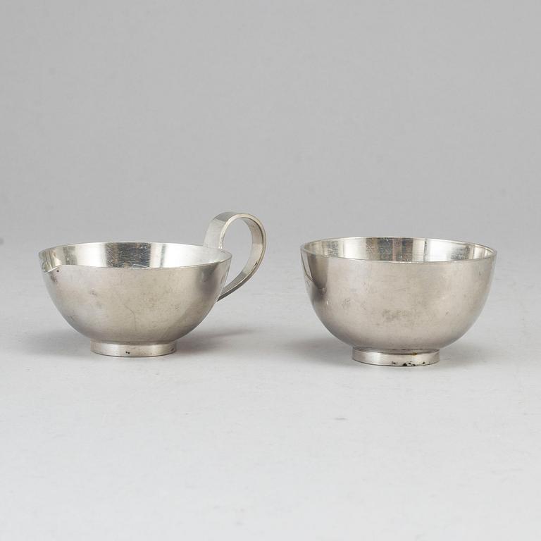 FIRMA SVENSKT TENN, a pewter sugar bowl and creamer. Stockholm 1957.