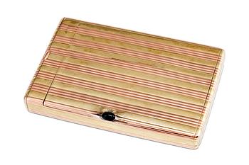 94. A GOLDEN CIGARETTE CASE, FABERGÉ.