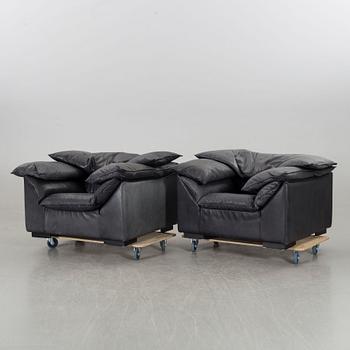 A PAIR OF "MONZA" LEATHER ARMCHAIRS BY EILERSEN.