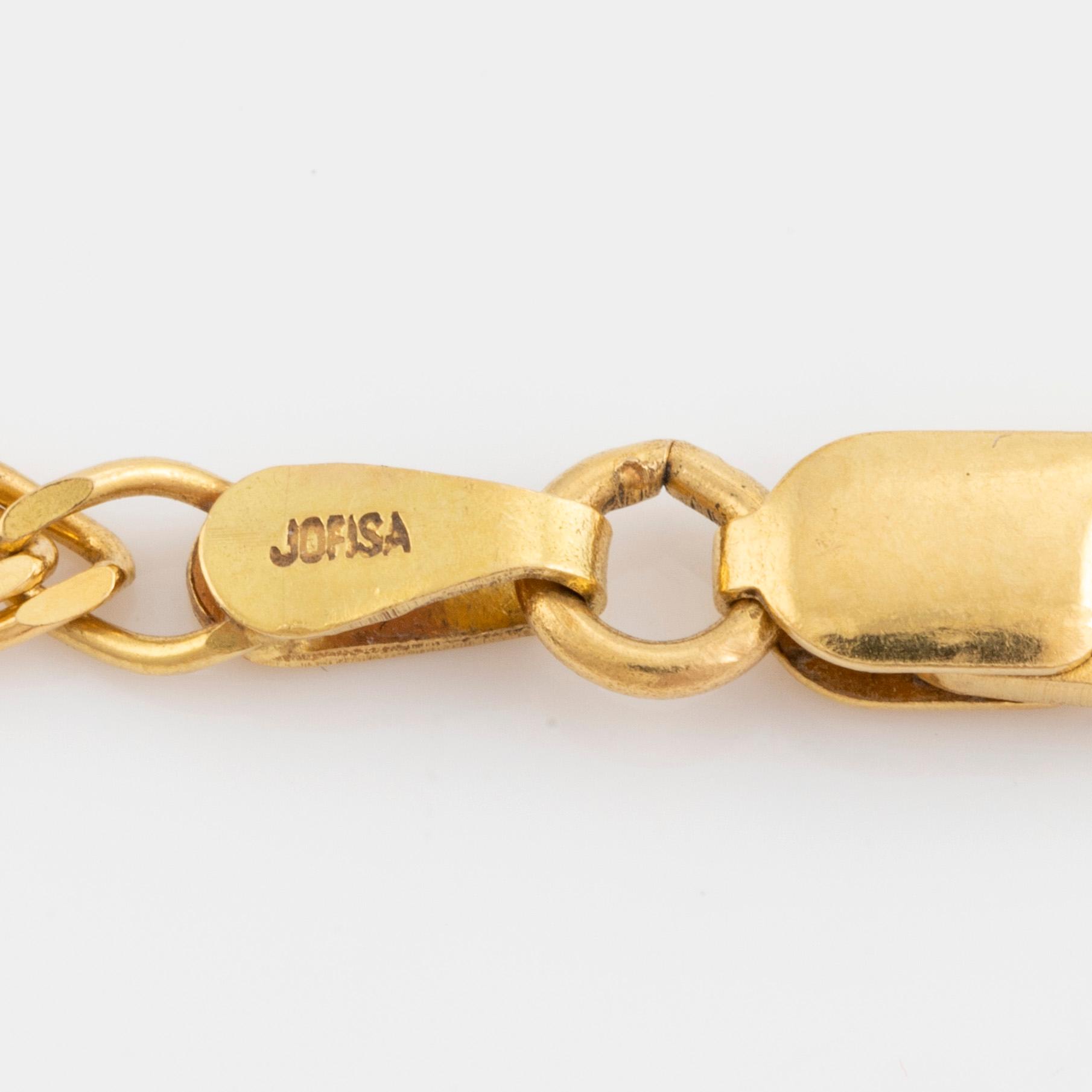 Gold, sapphire, ruby and brilliant cut diamond necklace, egyptian motif.