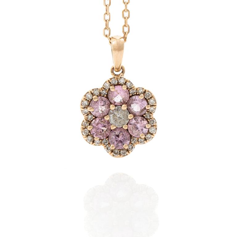 Collier, 18K guld med hänge i form av blomma med rosa safirer, vit mittsten och små diamanter.