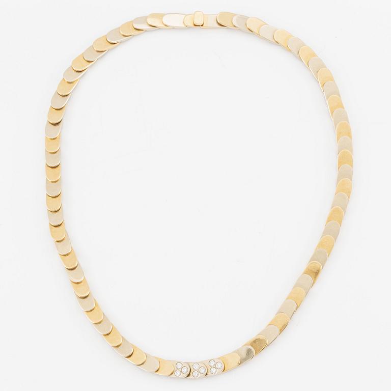 Gio Caroli, collier, 18K guld med nio briljantslipade diamanter.