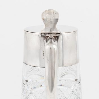 CG Hallberg, a silver and glass flagon, Stockholm 1918.