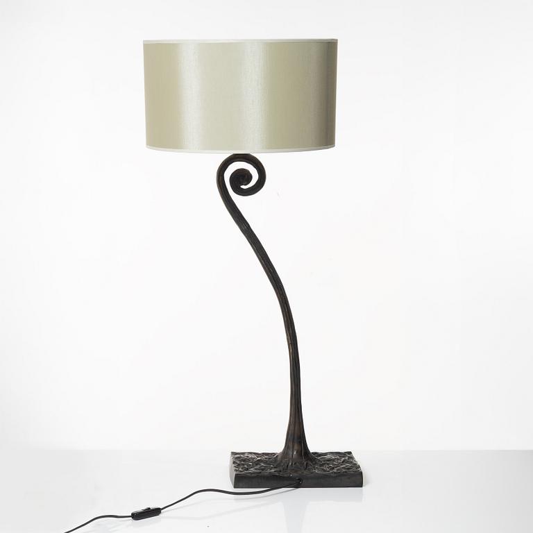 A bronze table lamp, circa 2000.
