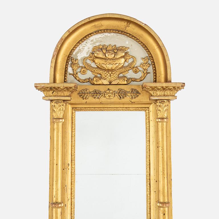 A lat Gustavian mirror from around  the year 1800.