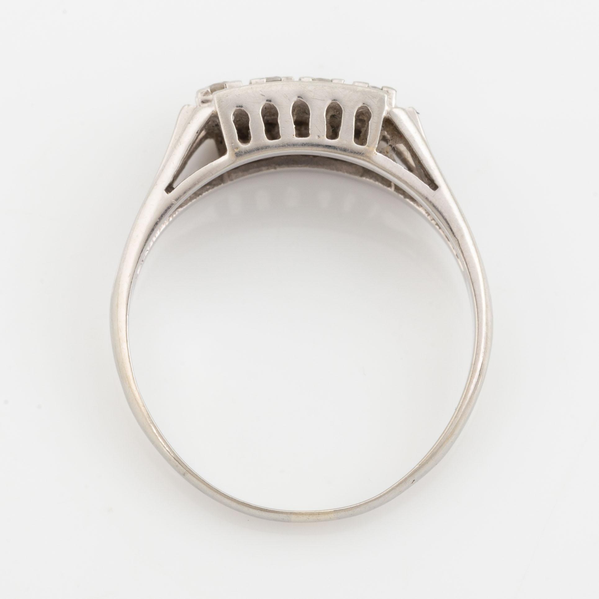 18K gold ring with diamonds.