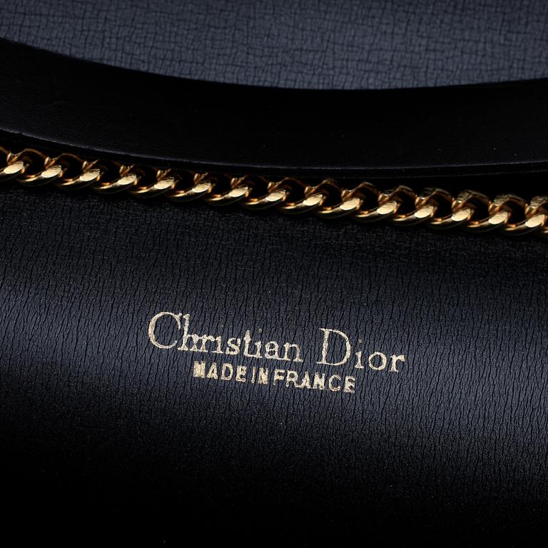 CHRISTIAN DIOR, a black canvas shoulder bag.
