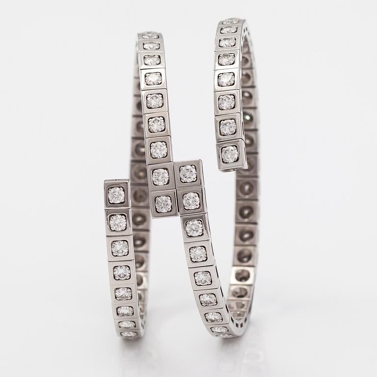 Cartier, Rannekoru "Tectonique", 18K valkokultaa, briljanttihiottuja timantteja n. 11.90 ct yht. Merkitty CT6808, JC.