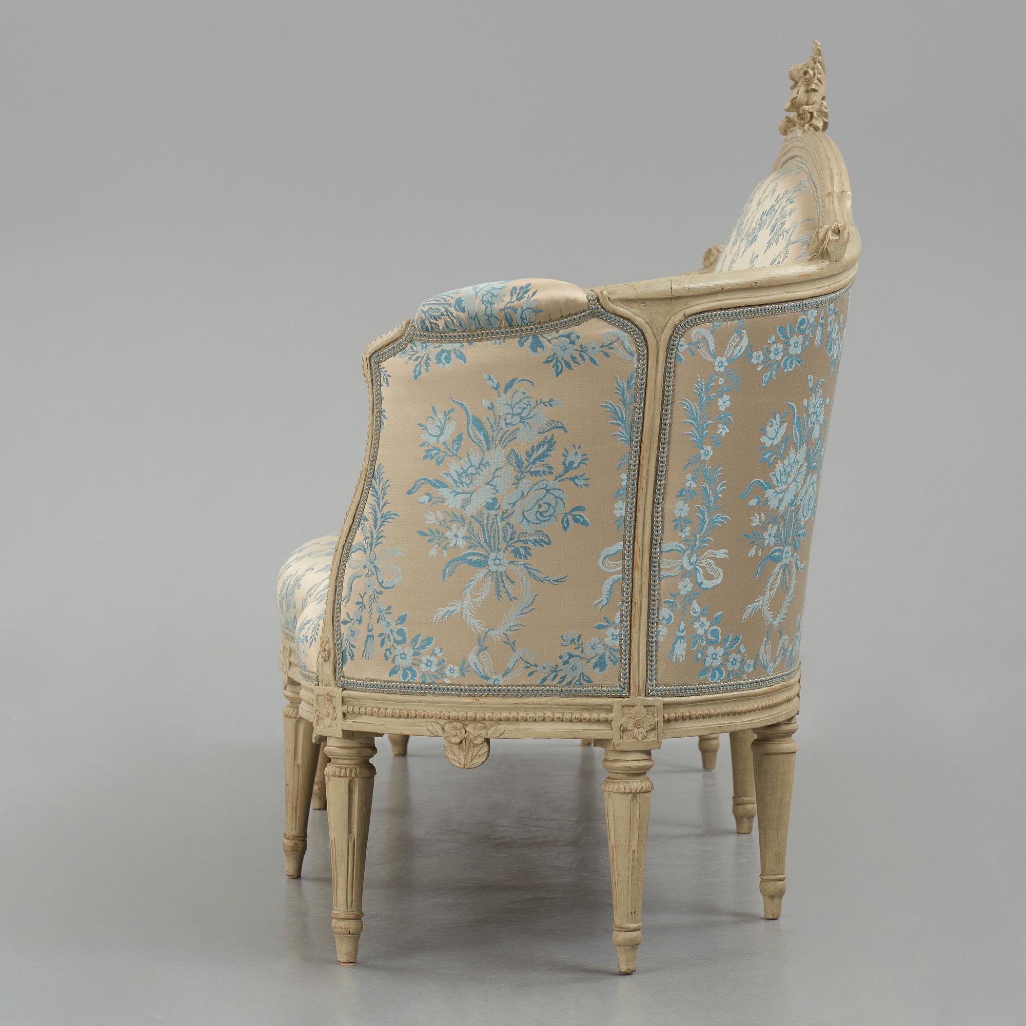 A grey-painted Gustavian 'canapé en corbeille'. sofa, by J E Höglander.
