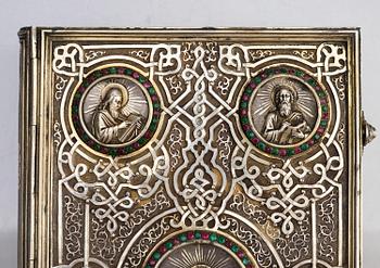 A Russian parcel-gilt silver book cover, mark of Sergei Vyerkovthyev, St. Petersburg 1873-1874.