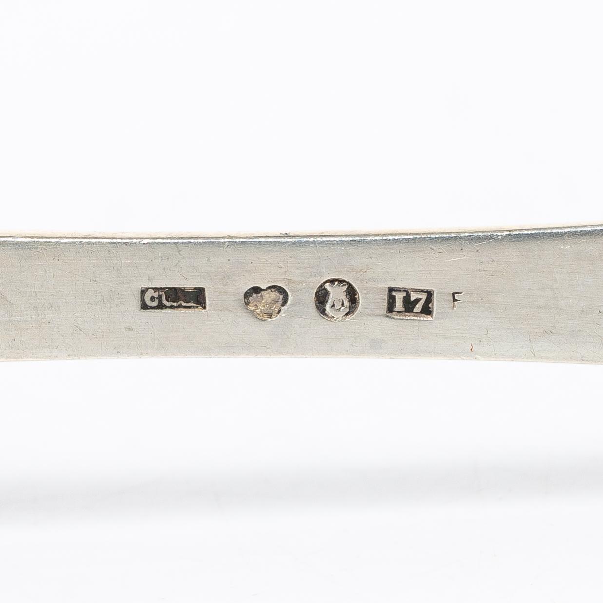 15 silver spoons, of which seven gilt, CG Hallberg, Stockholm, 1911-16.
