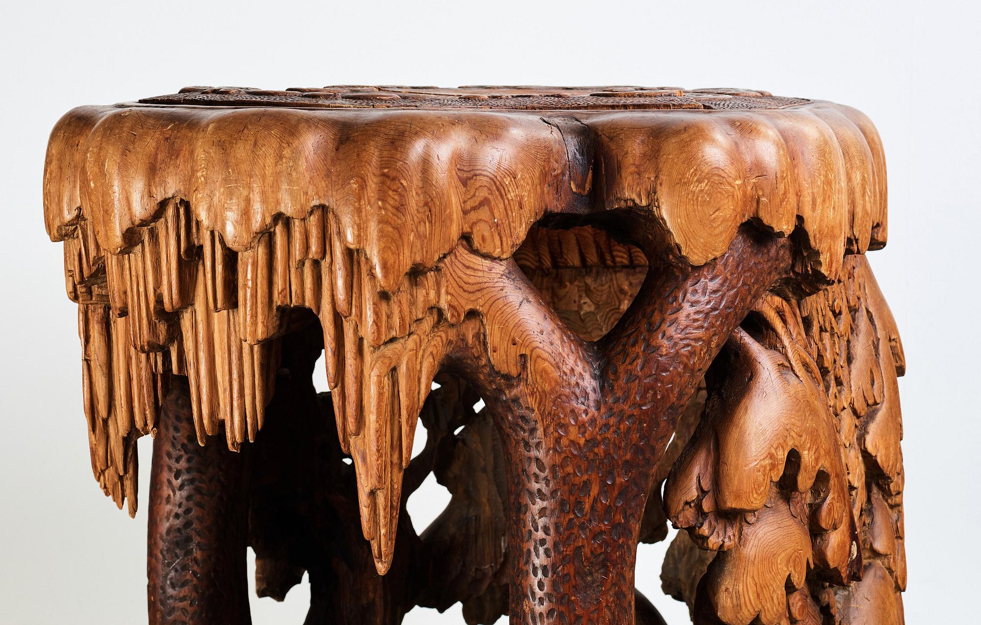 Knut Fjaestad, A Knut Fjaestad Art Nouveau sculptured pine table, Sweden ca 1900.