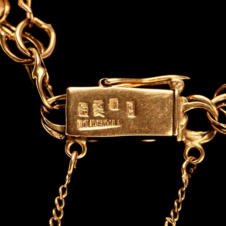 ARMBAND, 18k guld med berlocker. Vikt 17 g.