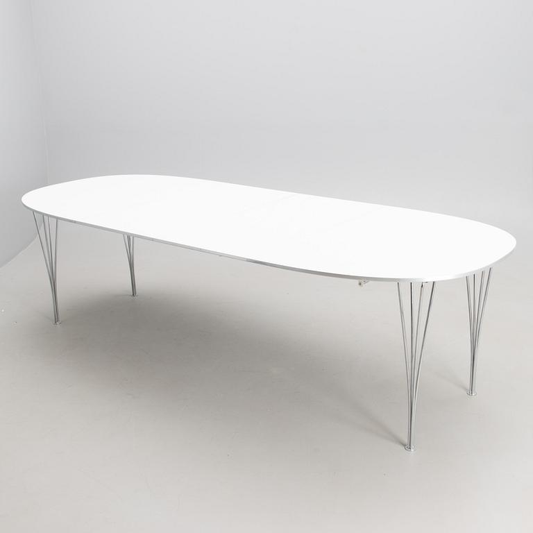 BRUNO MATHSSON AND PIET HEIN, a 'Superellips' dining table from Fritz Hansen, 1993.