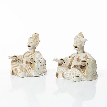 A pair of porcelain nodding head figures, Germany, 1920/30s.