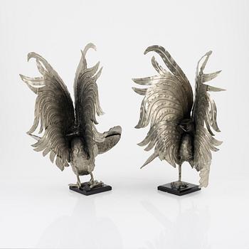 A pair of metal table decorations, 20th century.