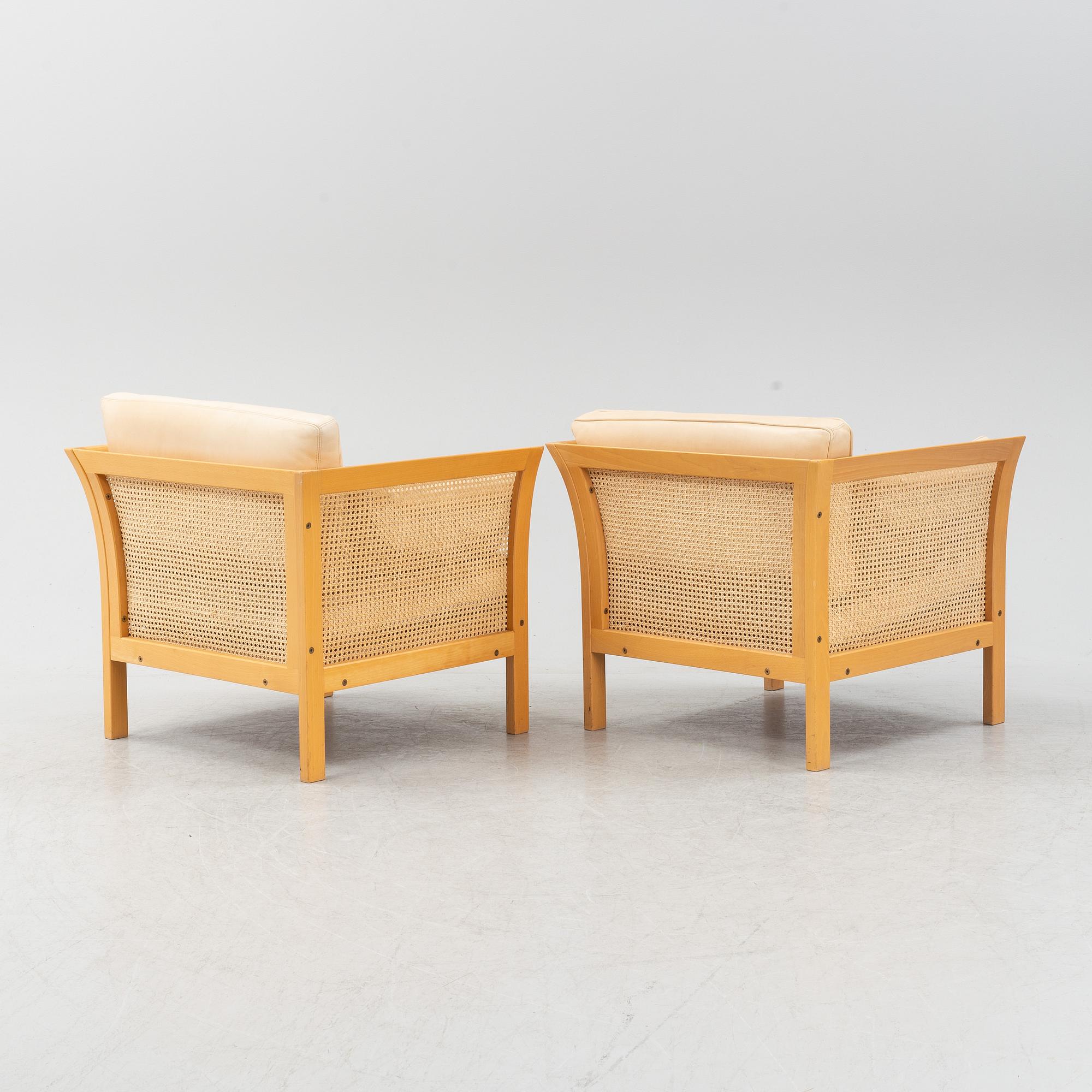 A pair of 'Rotan' easy chairs by Arne Norell, end of the 20th Century.