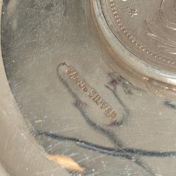 12 silver ashtrays with inlaid coins, silver, Pakistan, mid 20th century.