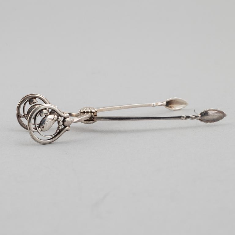 Three silver tongs, Sweden and Denmark, 1834-1923.