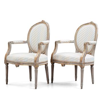 A pair of Gustavian late 18th century armchairs.